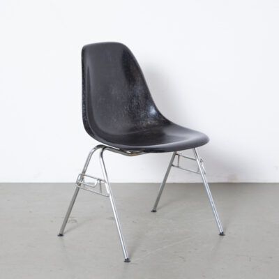 Eames DSS-N stacking side chair black Herman Miller fiberglass fibreglass shell dining base seat seating shock mount Charles Ray chrome tube frame stackable linking 50s fifties vintage retro mid-century modern tubular undercarriage plastic sparkle