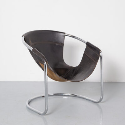 Clemens Claessen BA-AS lounge chair black thick saddle leather hung slung hanging seat element chromed tubular steel frame curved bent shapely tear repair patina original rare atelier Eindhoven Netherlands Dutch Design relax easy armchair sculptural 60s 1960s sixties vintage retro mid-century modern